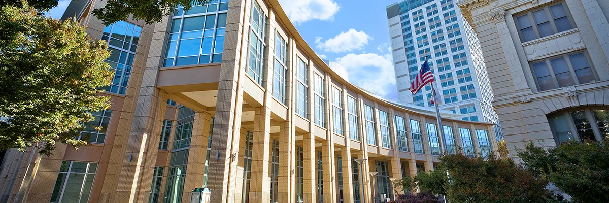 Sacramento City Hall exterior with a United States flag