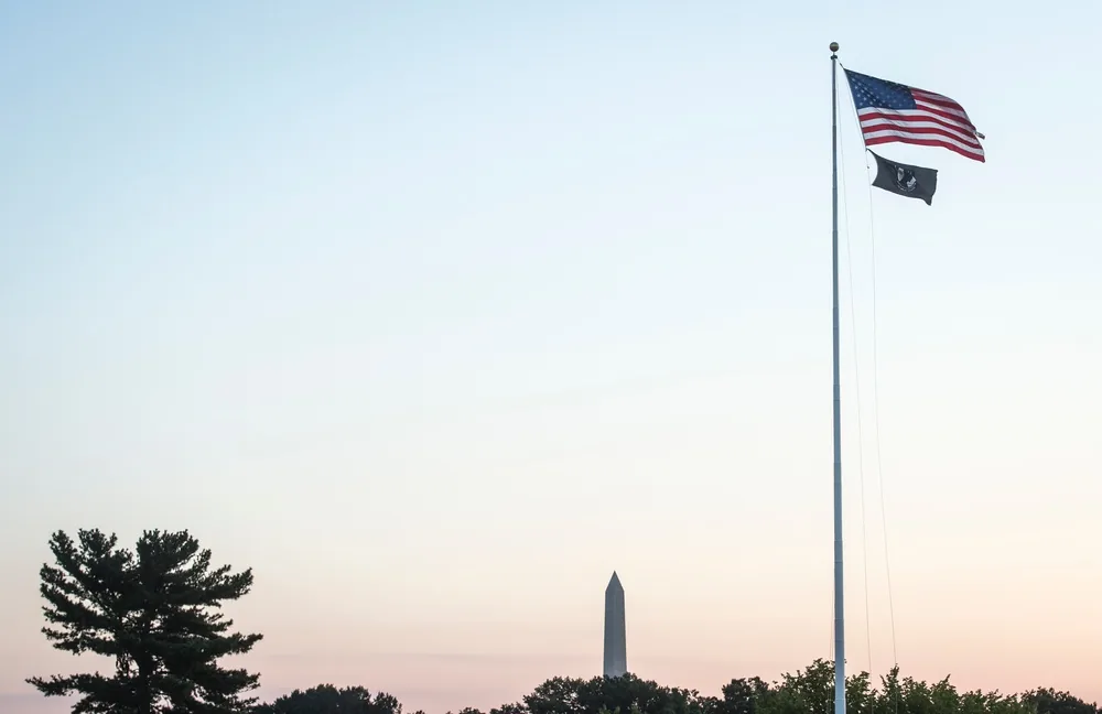 Pentagon Force Protection Agency personnel raising the POW/MIA flag at sunrise in 2017
